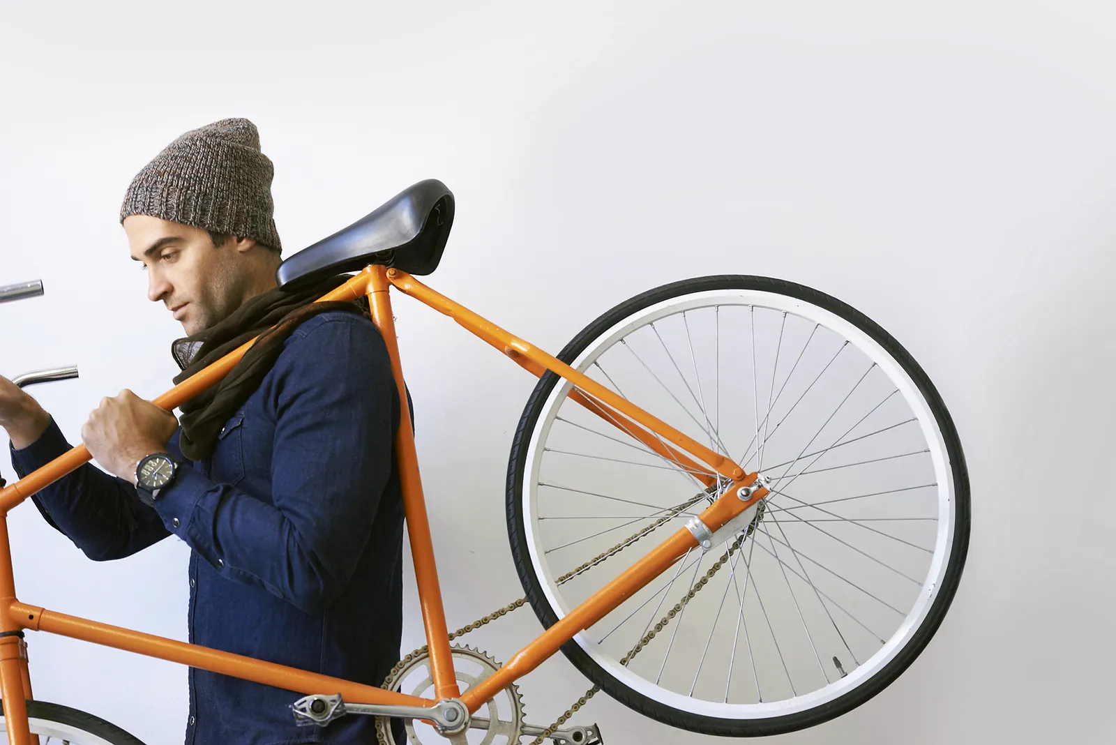 Man Holding Bicycle